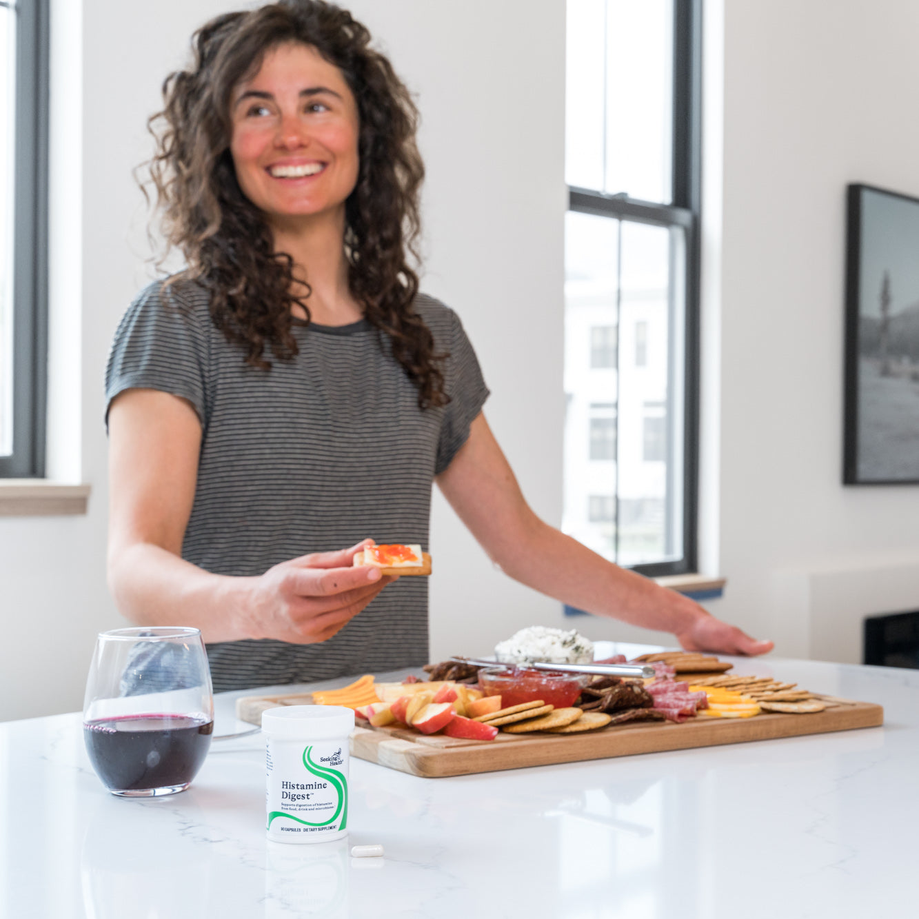Image of woman eating from table 